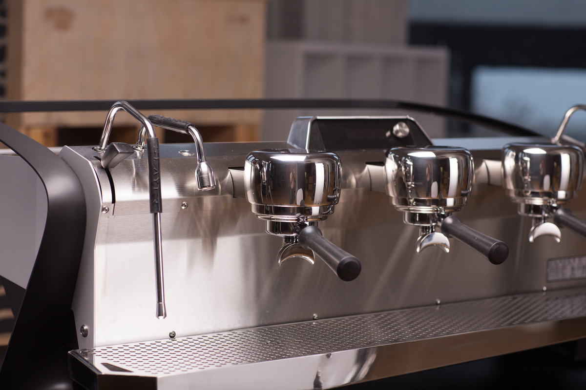 Close-up of a three-group Slayer espresso machine